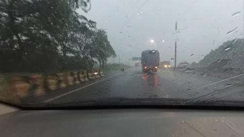 Heavy Rain while Driving, Surabaya East Java, Indonesia, Asia 動画素材 129061042