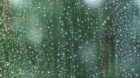 Heavy rain on a window Stock Footage 10788196