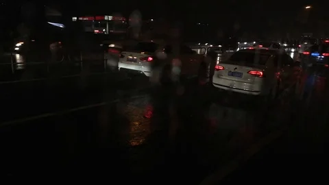 Heavy raindrops fall on car window on the highway Stock Footage 115879135