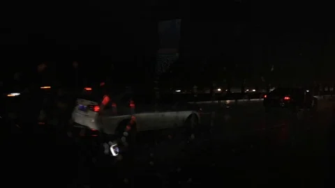 Heavy raindrops fall on car window on the highway Video stock 115894142