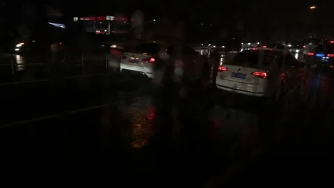 Heavy raindrops fall on car window on the highway Stock Footage 115894184