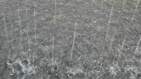 Heavy raindrops on the sand. Stock Footage 164342672