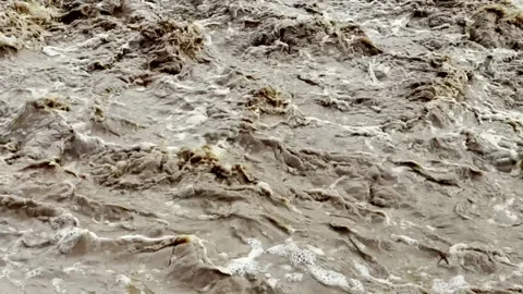 Heavy Rainfall Causing Flooded Stream with Muddy Water Vidéo 339779157