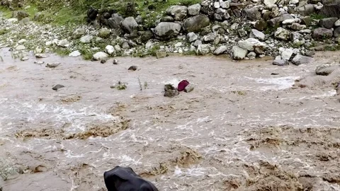 Heavy Rainfall Causing Flooded Stream with Muddy Water Видео 339779397
