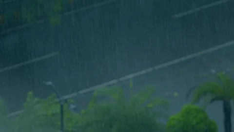 Heavy rainfall shots and traffic moving on road crossed delhi NCR india Stock Footage 314887667