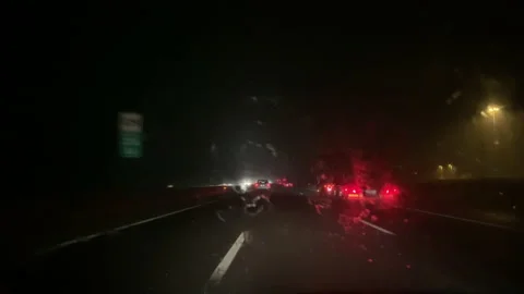 Heavy rainfall while driving in a car at night. Stock-Footage 142064599