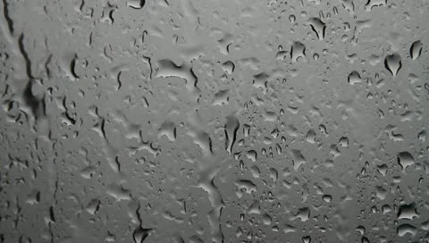 Heavy rainfall on window glass Stock Footage 11315262
