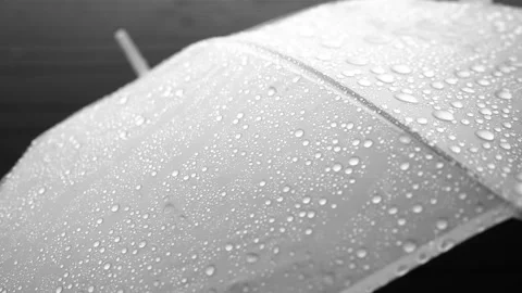 Heavy Raining day, Rain drops holding and falling on to waterproofs Umbrella Stock Footage 198798490