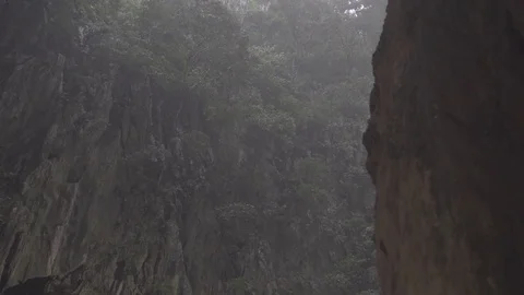 Heavy raining outside a cave in the rainforest slog2 Video stock 82446426