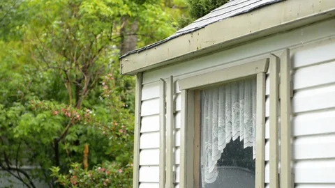 Heavy raining on a shed Stock Footage 109213737