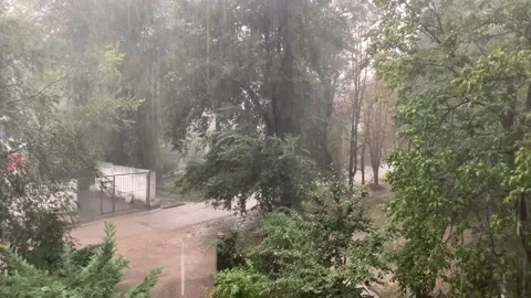 Heavy Raining, view from the window of block of flats (with natural sound) Stock Footage 141342811