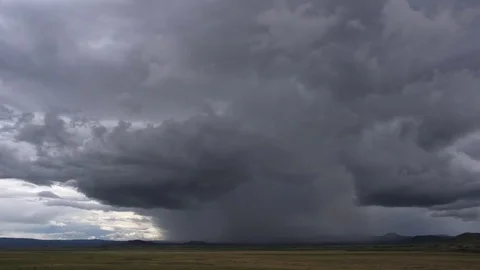 Heavy rainstorm advancing over prairie, time lapse Stock Footage 81195338