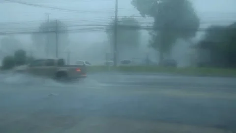 Heavy rainstorms make traveling difficult and dangerous. Stock Footage 250075228