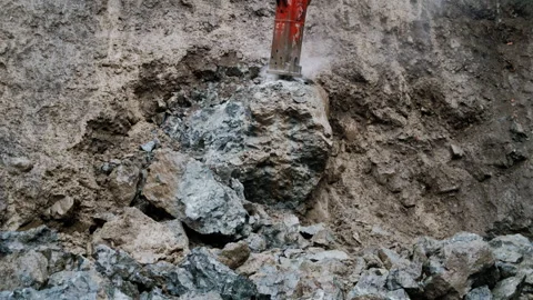Heavy Rock Drilling Machine in Action, Breaking Rock and Stones Falling 库存影片 302217133