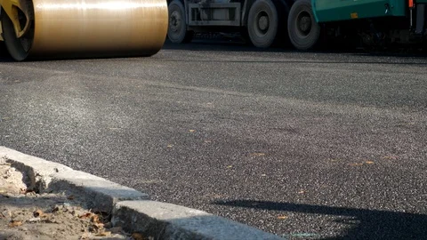 Heavy Roller Stack and Press Hot Asphalt Stock Footage 123170029