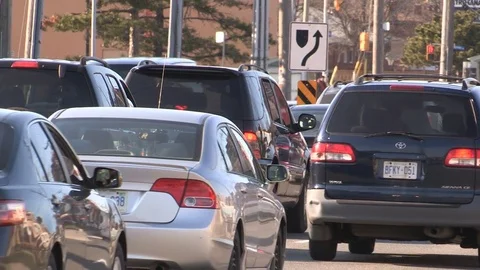 Heavy rush hour traffic jam and gridlock in city streets and intersection Stock Footage 74487510