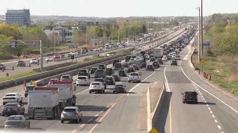 Heavy rush hour traffic jam and gridlock on highway heading home after work Stock Footage 154148089