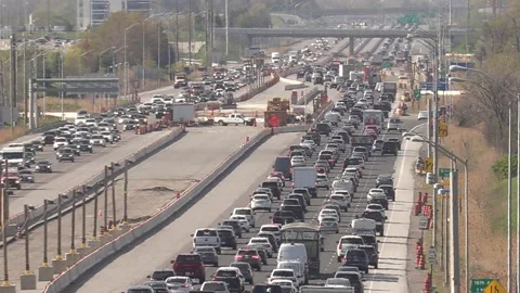 Heavy rush hour traffic jam and gridlock on highway heading home after work Stockbeeldmateriaal 154148310