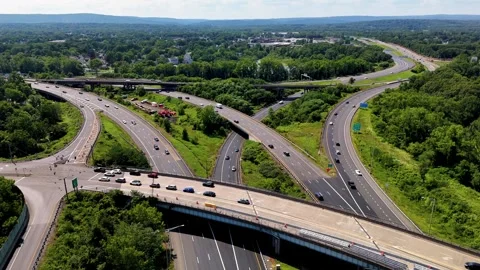 Heavy rush hour traffic moves along a busy highway during peak... Stock-Footage 340657919