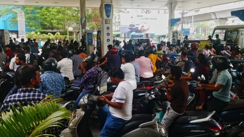 Heavy Rush at Petrol Station with Long Queue of Motorcycles in bharat petrol Stock Footage 334268927