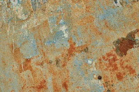 Heavy rust on blue metal sheet. Peeling paint iron plate background. Old ru.. Stock Photos