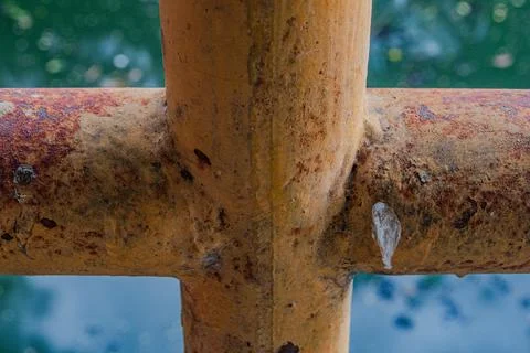 Heavy rust iron pipe cross joint Stock Photos