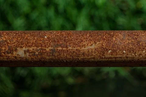 Heavy rust texture on industrial iron pipe near midnight Stock Photos