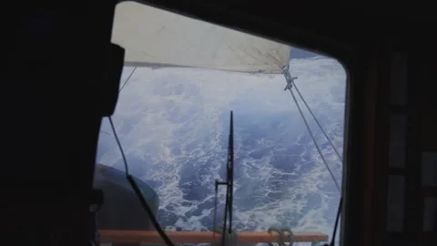 Heavy seas seen from sailing ship cabin 스톡 동영상 337951604