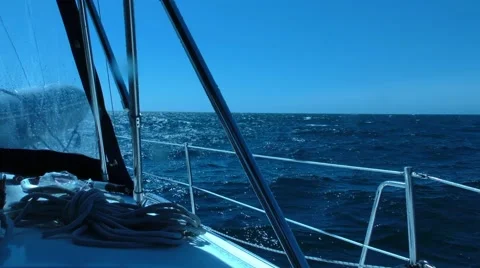 Heavy seas seen from starboard side of deck waves splashing on camera in open Video stock 67512854