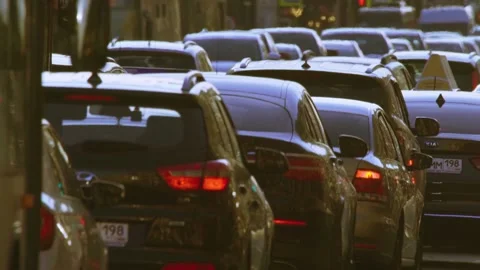 Heavy slow traffic in evening warm lighting on Nevsky Prospect Stock-Footage 146978705