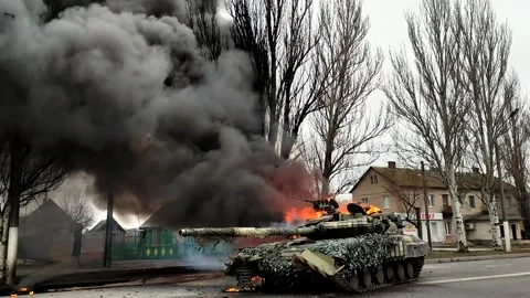 Heavy smoke cloud rises up from burning Ukrainian tank Stock Footage 186915383