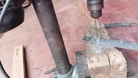 Heavy Smoke from Cutting Oil While Drilling Metal Bar Video stock 330387430