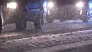 Heavy Snow And Traffic At Night In Winter Storm Stock Footage