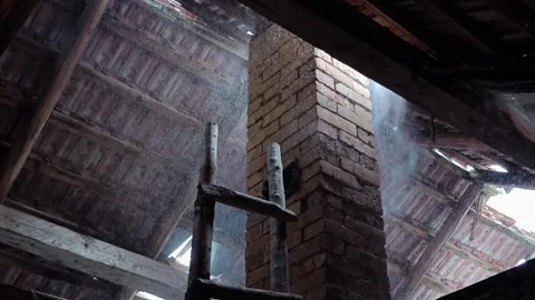 Heavy Snow Blowing Through Crack in Old Abandoned House Roof Stock Footage 334239104