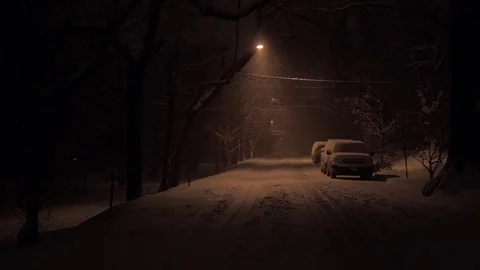 Heavy Snow Falling Under Street Light at Night 库存影片 72436743