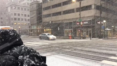 Heavy snow falls in Philadelphia as second noreaster arrives Stock Footage 106318075