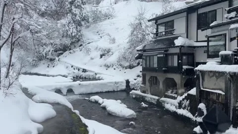 Heavy Snow Hot Spring Town with Water Stream Japan Видео 344964425