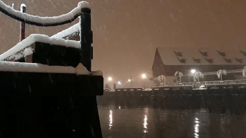 Heavy snow at the river pier - 2 Stock Footage 101371289
