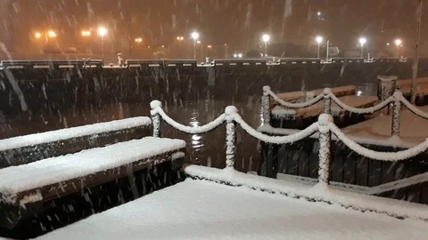 Heavy snow at the river pier. Everything covered with snow 스톡 동영상 101371219