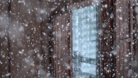 Heavy snow with a window in the background Stock Footage 83108033