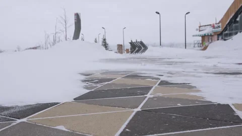 Heavy snowfall and blizzard on the road in winter Stock Footage 329234359