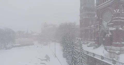 Heavy snowfall and wind around St. John's Church Stockbeeldmateriaal 86322306