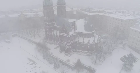 Heavy snowfall and wind around St. John's Church Stockbeeldmateriaal 86322988