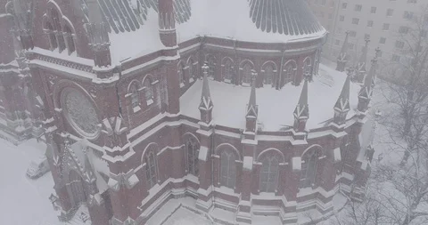 Heavy snowfall and wind around St. John's Church Stockbeeldmateriaal 86324565