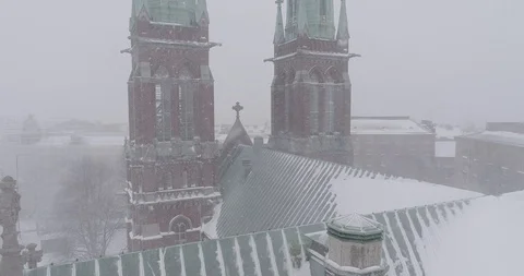 Heavy snowfall and wind around St. John's Church Stock Footage 86324740