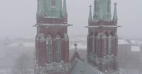 Heavy snowfall and wind around St. John's Church Stockbeeldmateriaal 86324920
