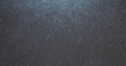 Heavy snowfall on the background of sky in a winter night Stock Footage 87078552