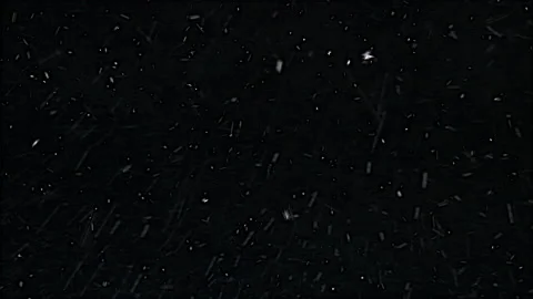 Heavy snowfall on a black background. Blizzard snow Stock Footage 138743396