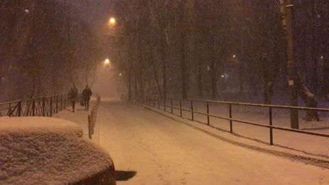 Heavy snowfall in the city Stock Footage 88680966