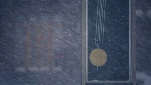 Heavy snowfall in the city.The town clock covered with snow. Stock Footage 69962448